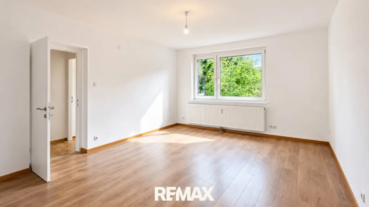 Wohnzimmer mit traumhaften Grünblick