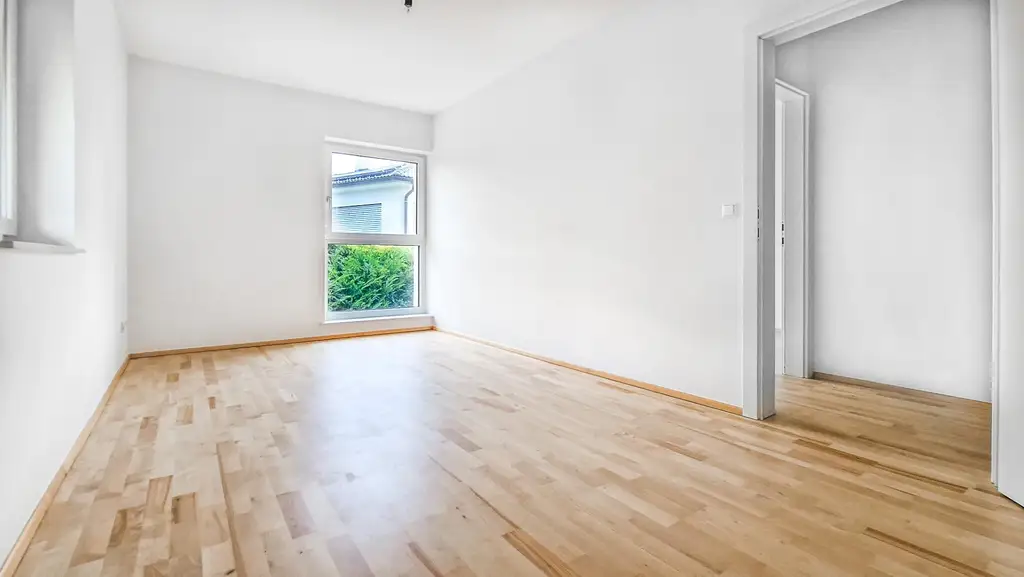 Niedrigenergie-Doppelhaushälfte in Mauer. 5 Zimmer, Terrasse, Garten und Autostellplatz