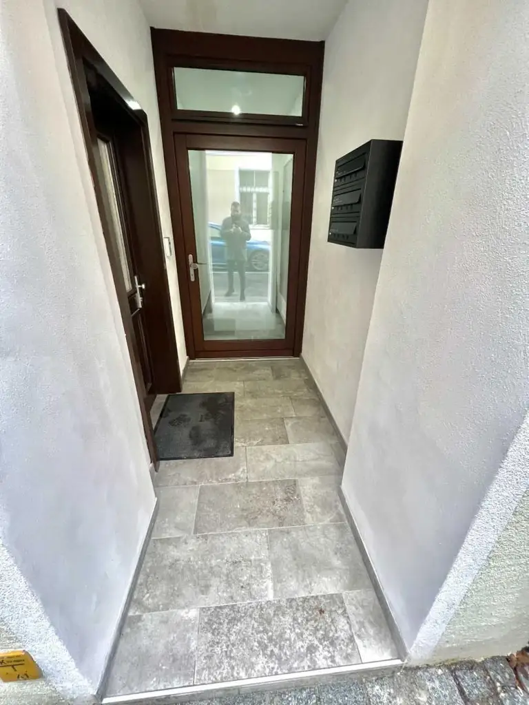 Stadthaus mit Geschäftslokal 2 Wohnungen & Dachterasse