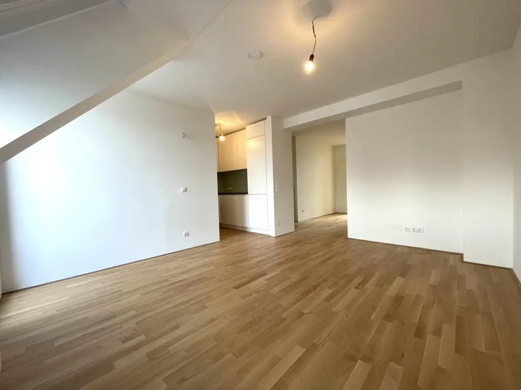 Klimatisierte Neubauwohnung mit hofseitigem Balkon im Dachgeschoss!!!