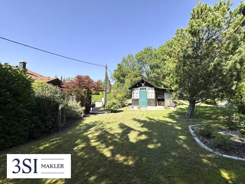 Traumhaftes Wohnen: Bungalow mit Pool & zusätzlichem Grundstück