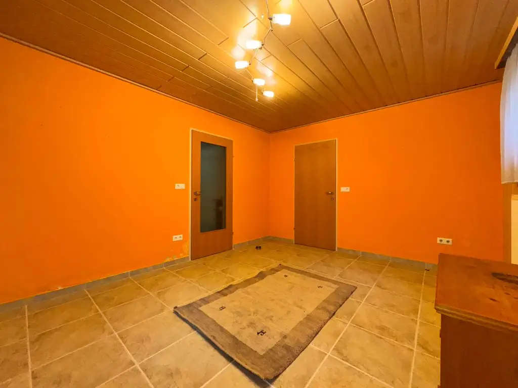 XXL Traum Bungalow mit Kachelofen überdachter Terrasse, Gartenoase, Wohnkeller und Doppelgarage  im Laahfeld /Ansfelden