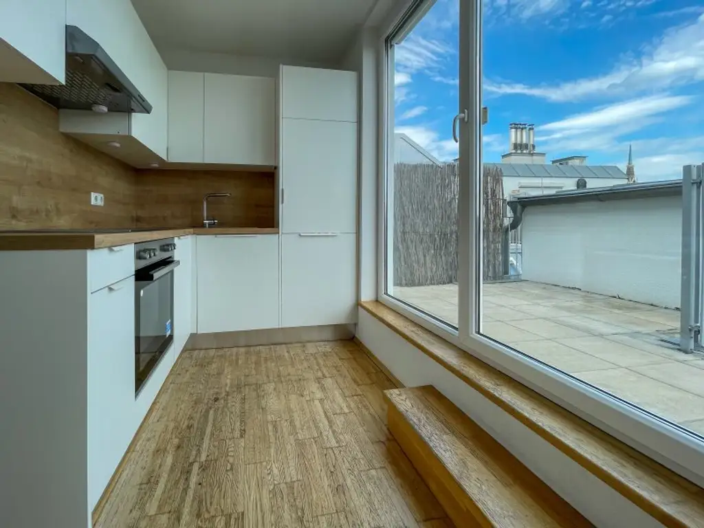 DG-Maisonette mit Terrasse – Wohnen auf zwei Ebenen in ruhiger Stadtlage mit Weitblick