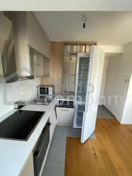 Dachgeschossmaisonette mit einer Traumterrasse und vollmöblierter Küche