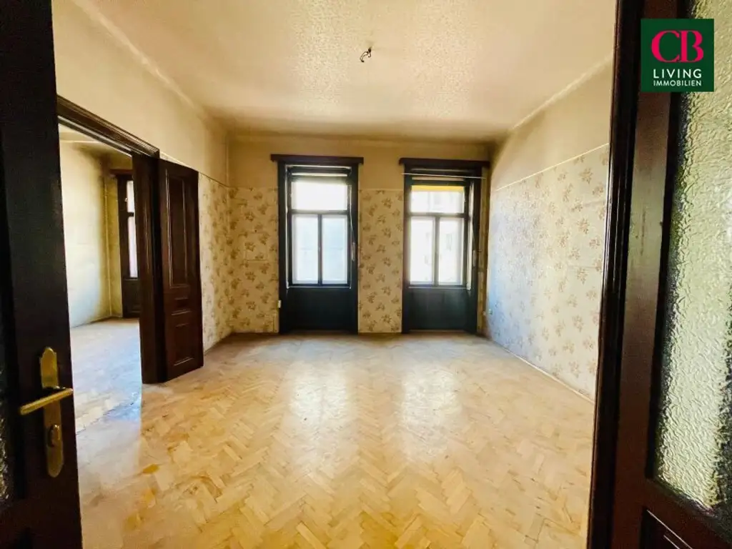 SANIERUNGSBEDÜRFTIGE WOHNUNG IM REPRÄSENTATIVEN JAHRHUNDERTWENDEHAUS