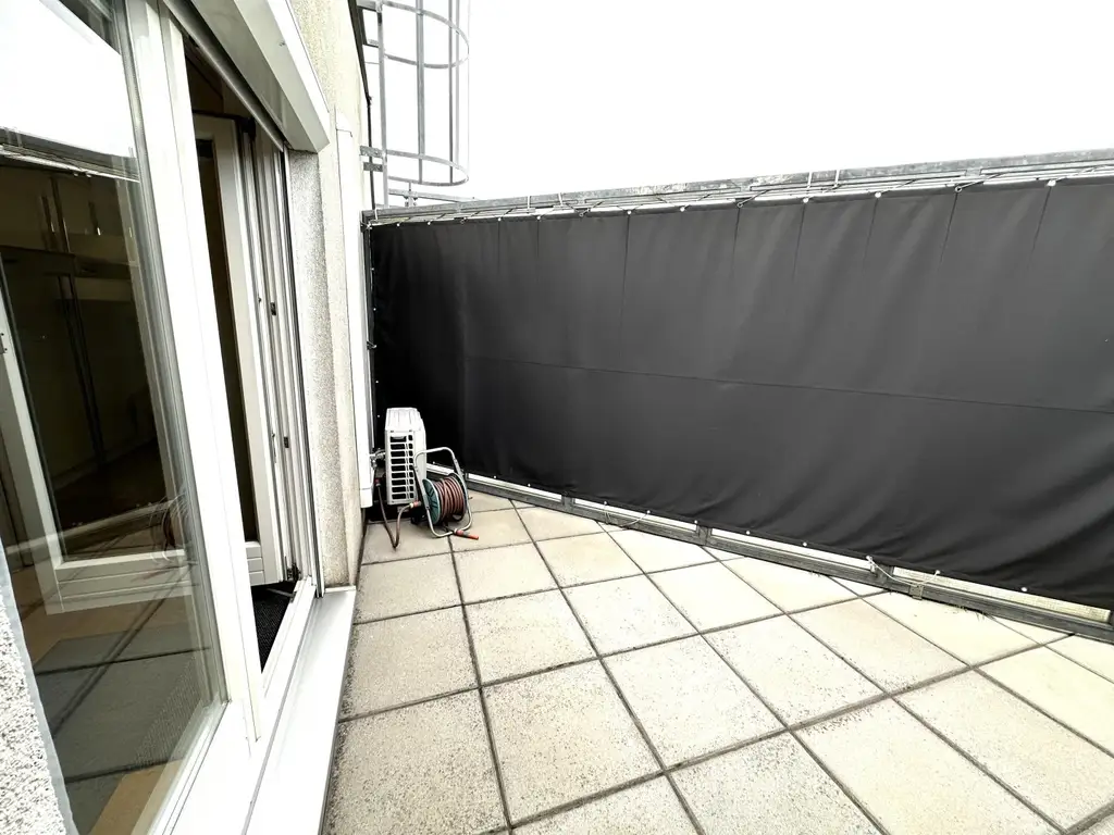 "Moderne Dachgeschosswohnung mit großer Terrasse & Garagenstellplatz"