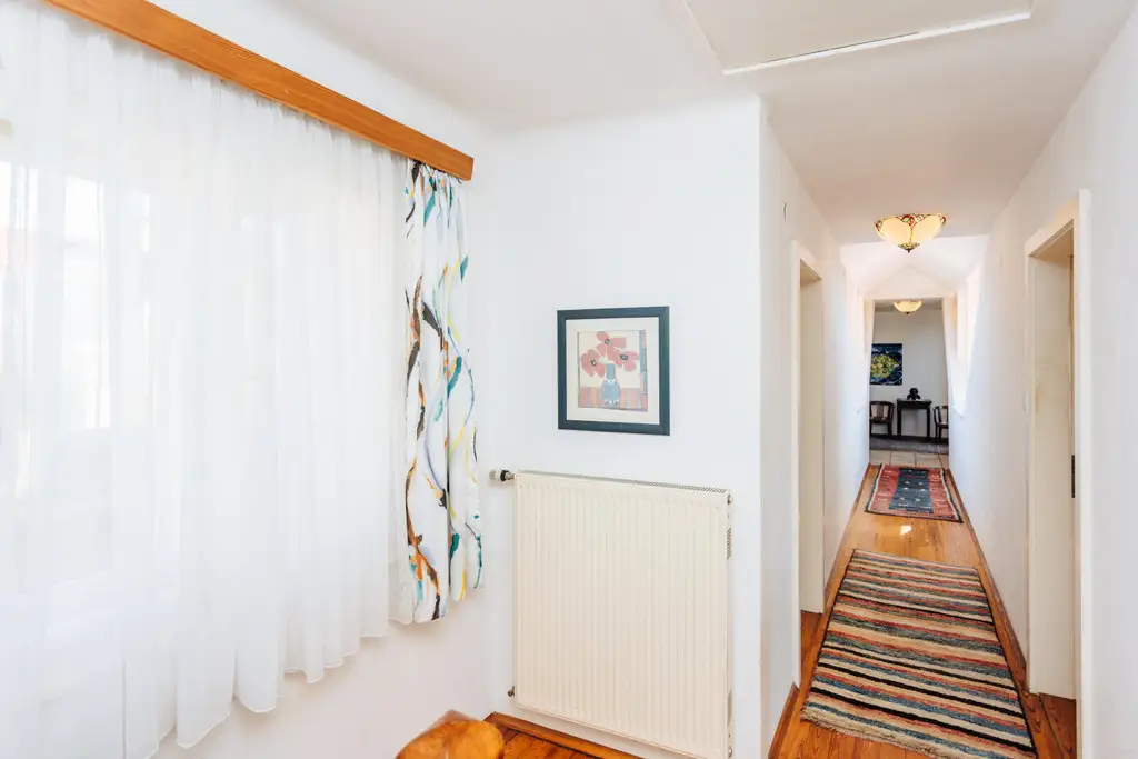 Großzügiges Einfamilienhaus mit Schwimmteich in Weinitzen - ländliche Geborgenheit trifft modernen Wohnkomfort