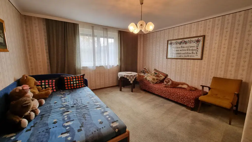 Vielseitiges Mehrfamilienhaus mit Charme und einladendem Garten