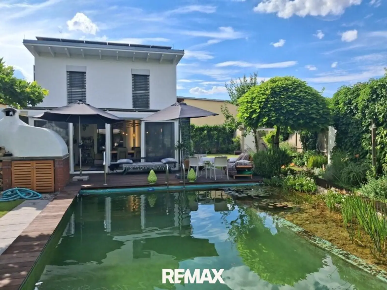 1 Haus mit Biotop Pool 1220