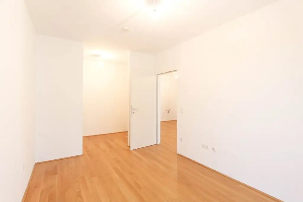 Sonnige Wohnung mit Blick ins Grüne, Balkon und Garage!