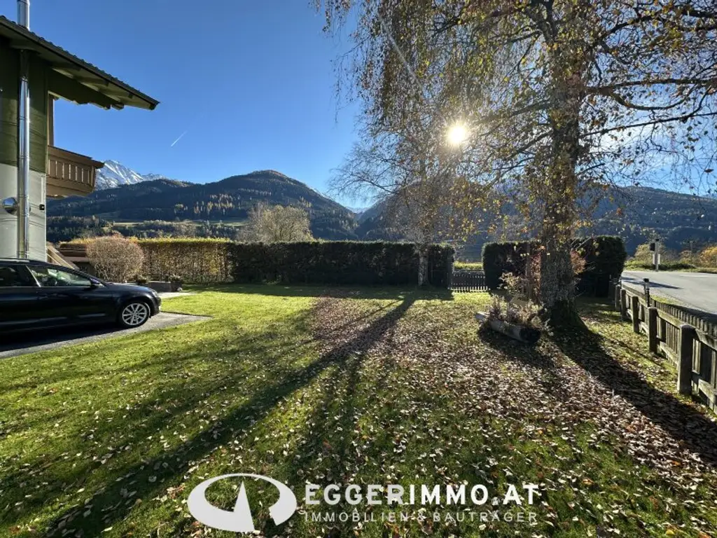 Niedernsill - Spacious 4-Room Apartment with Garden & Balcony for Sale in a Two-Party House