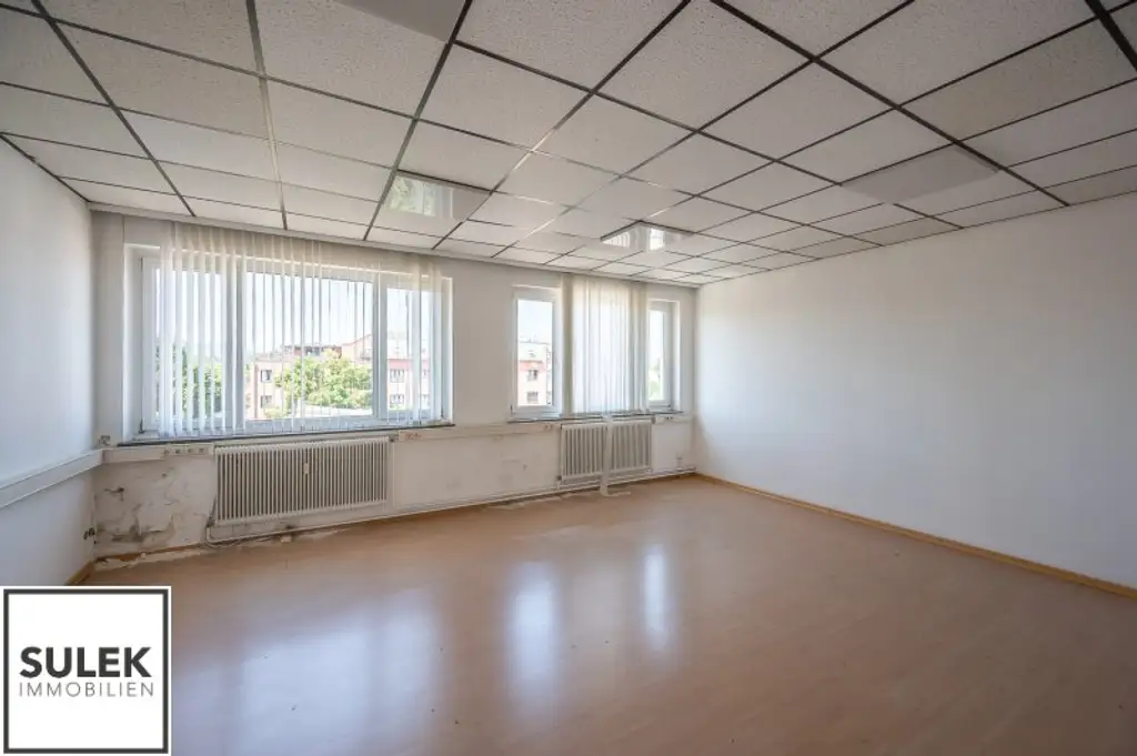 Grundstück mit vier Baukörpern - Büro-, Geschäfts- und Gewerbegebäude inkl. Parkplätzen in Vösendorf