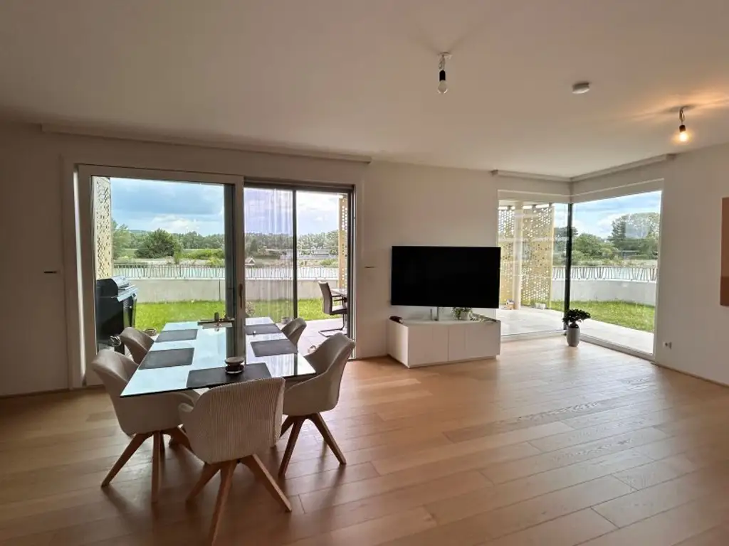 EXKLUSIVES WOHNEN IN „THE SHORE“ – MIT PRIVATEM GARTEN, TERRASSE & DONAUBLICK UND GARAGE