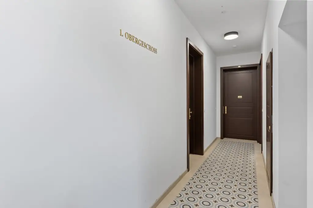 4-Zimmer-Altbaueigentumswohnung in generalsaniertem Altbau mit Balkon