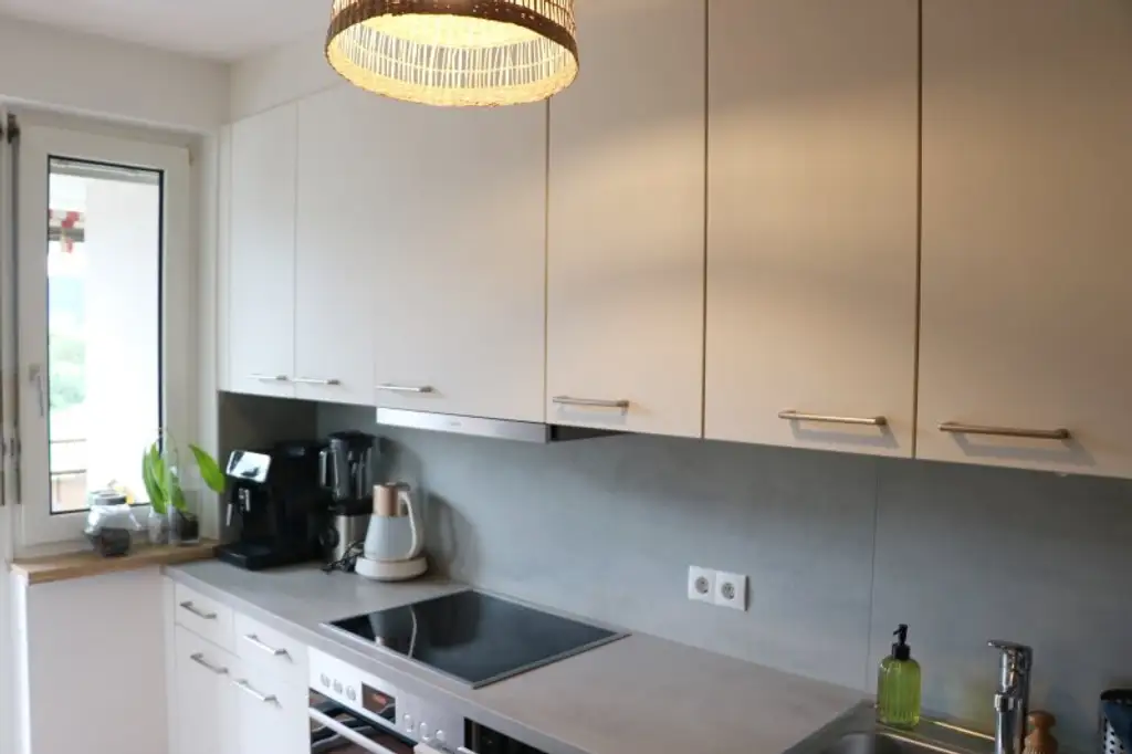 Geräumige Wohnung mit Balkon und TGAP bei der USI - befristet vermietet