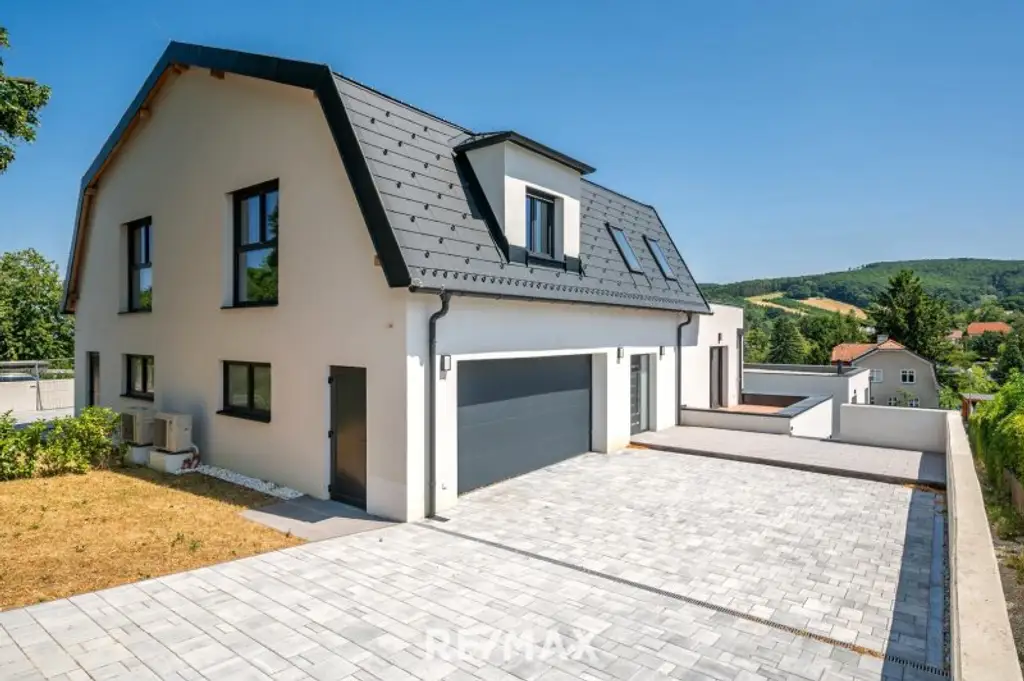 Erstbezug: Großzügiger Familientraum mit unverbaubarem Grünblick!