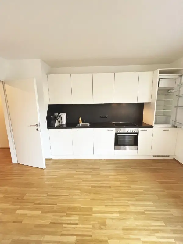 Moderne 2-Zimmer-Wohnung mit ruhiger Terrasse und Dachgarten - 
in U-Bahn-Nähe!