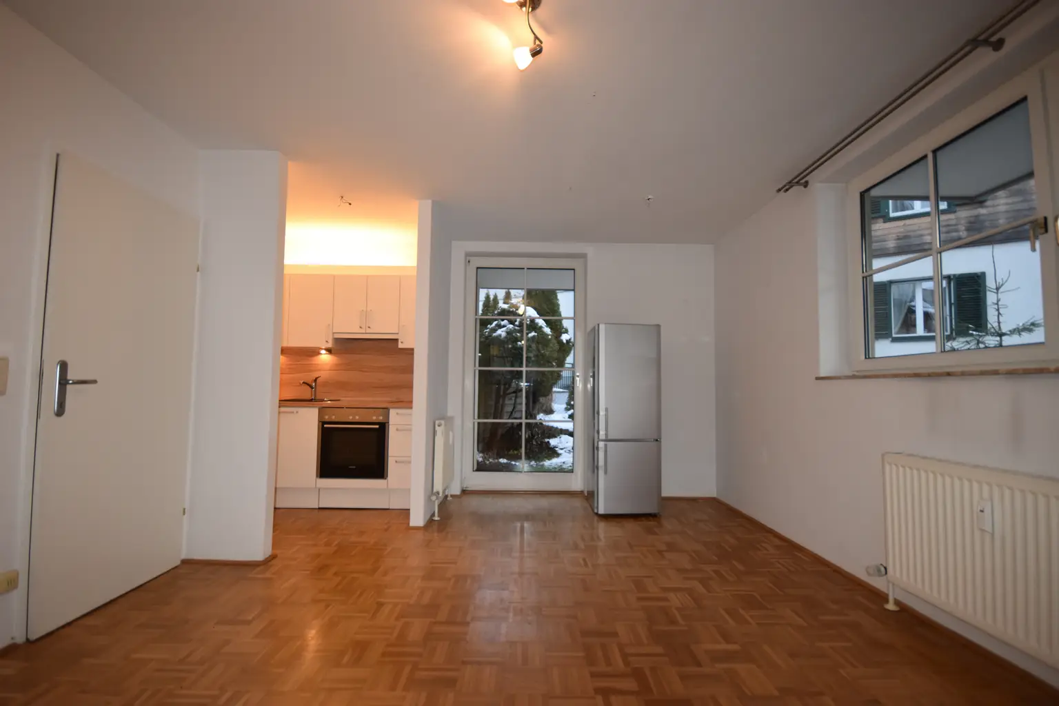 "AIGEN - Kleine gemütliche 2 Zimmer Wohnung mit Garten und PKW-Stellplatz"