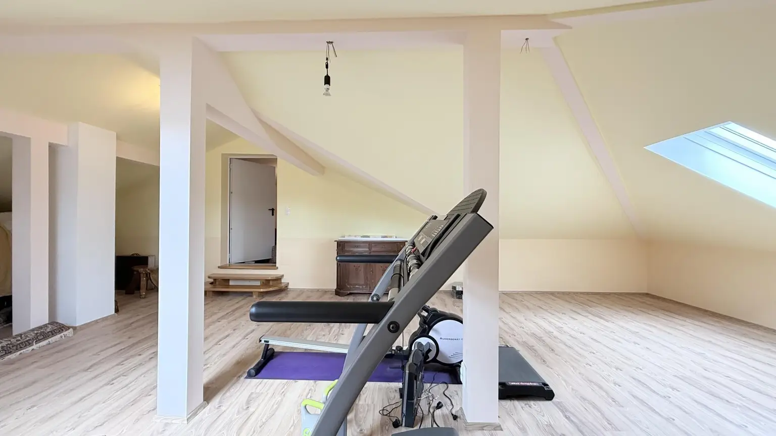 Fitnesraum über der Garage