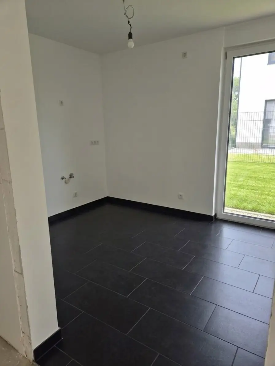 Neubau - Tolle Doppelhaushälfte belagsfertig - Neufelder See schnell erreichbar!