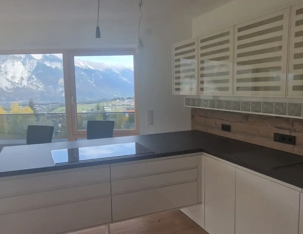 Luxuriöses Wohnen in Tirol - Erstbezug mit Garten, Terrasse und Bergblick