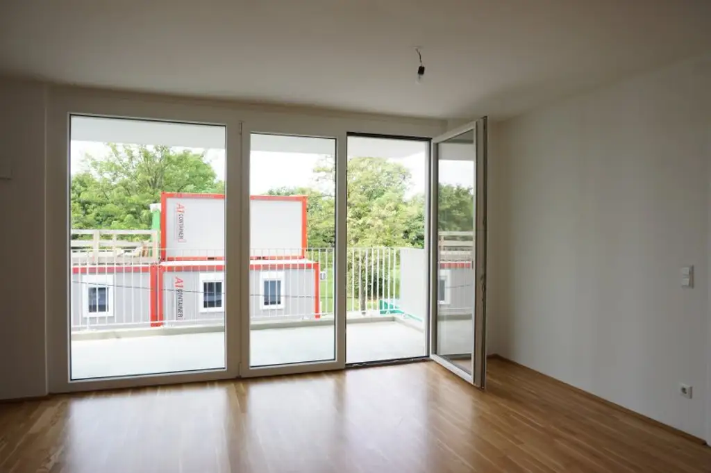UNO - U1 Am Kaisermühlendamm  - Neubau mit großem Balkon und Garage - Mietbeginn ab 15. November 2025 | New 1BR apartment with Garage - start of lease 15/11/2025