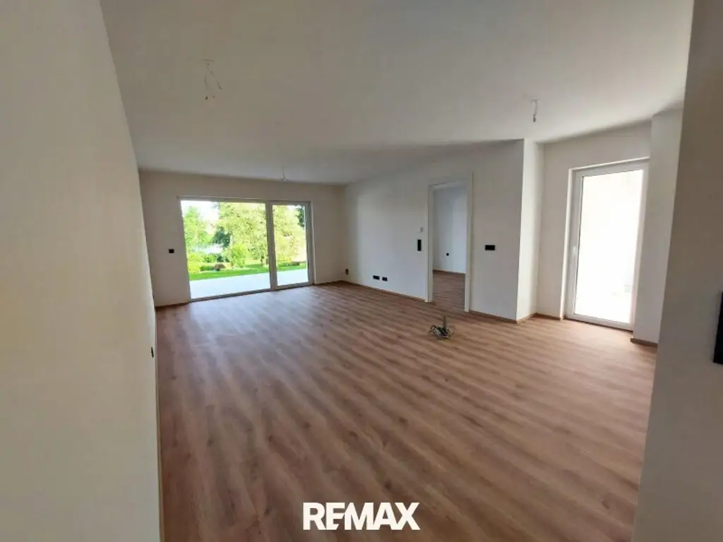 Erstbezug -Gartenwohnung! 3 Zimmer mit 2 Balkonen & großem Privatgarten