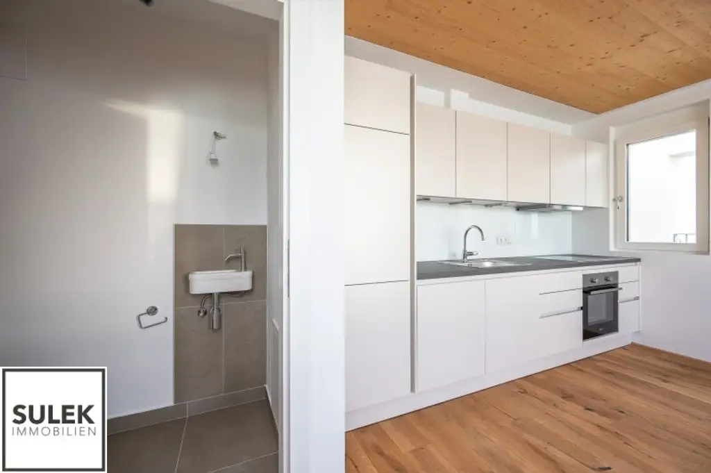 Erstbezug: 3-Zimmer-Maisonette mit hofseitiger Terrasse