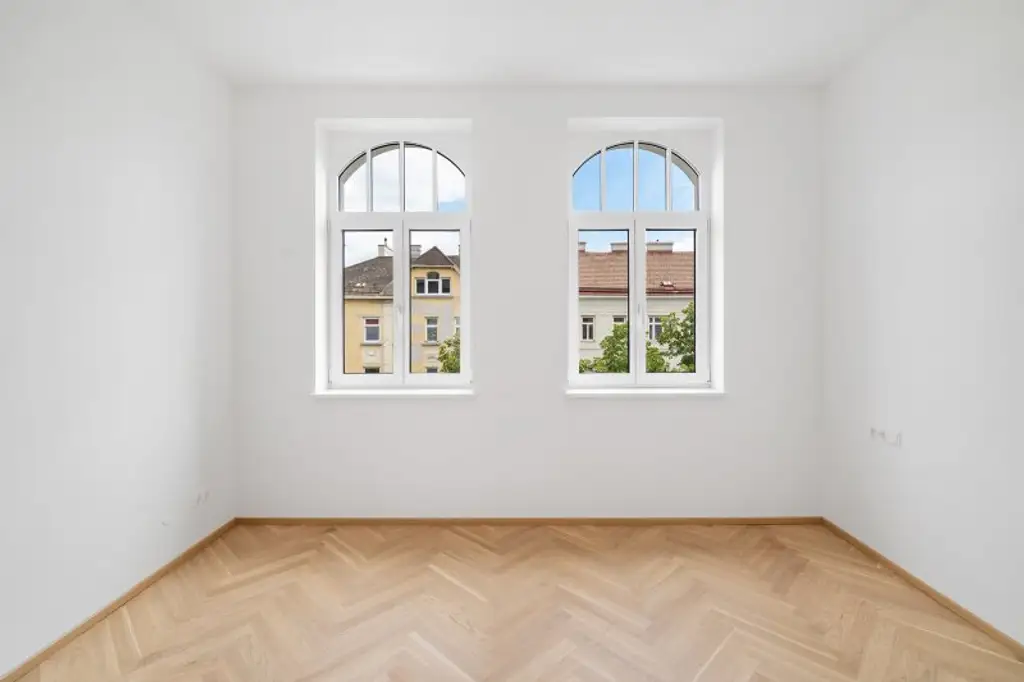 4-Zimmer-Altbaueigentumswohnung in generalsaniertem Altbau mit Balkon