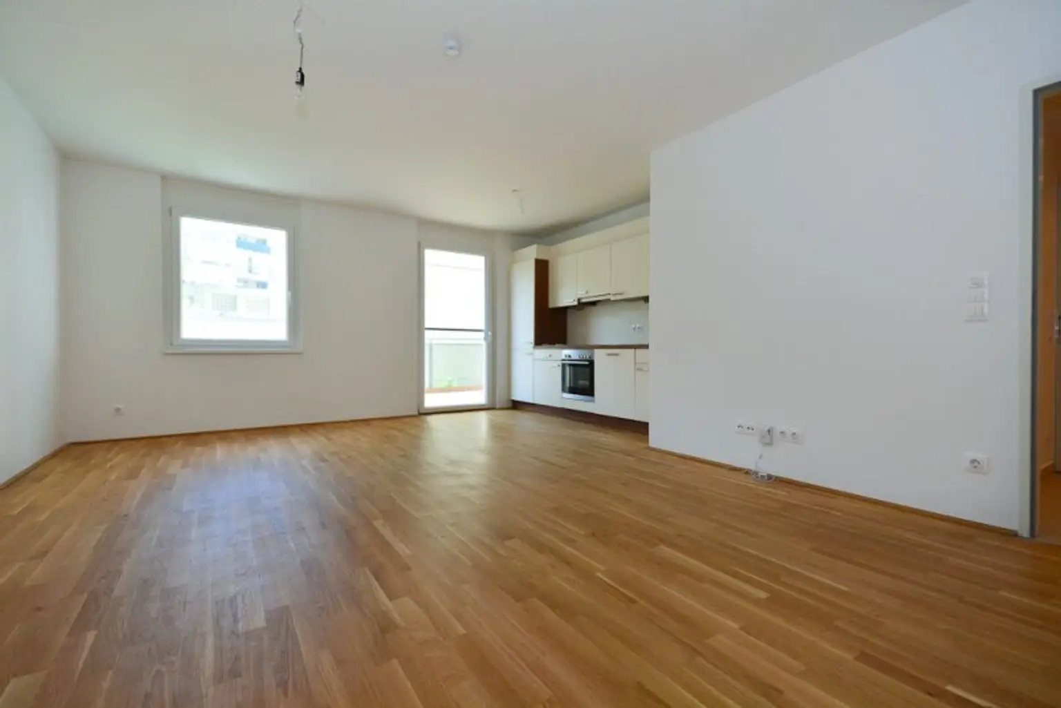 3 Zimmer Neubauwohnung mit Balkon und Garten