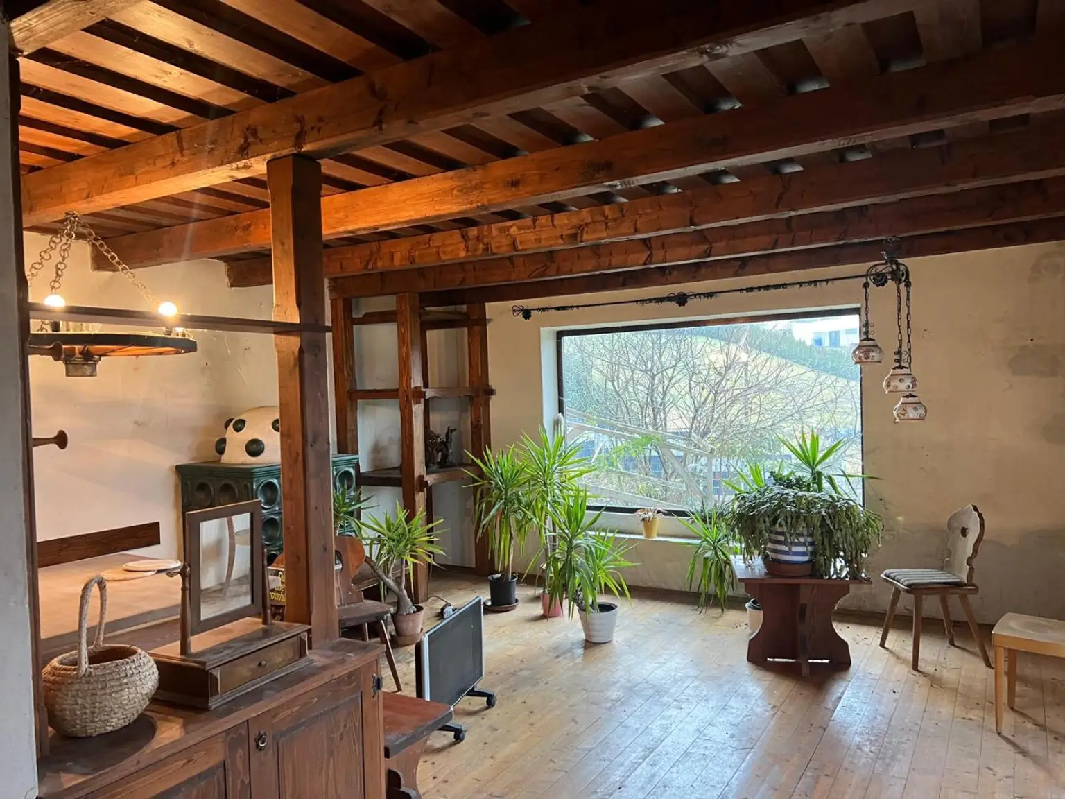 Wohnzimmer EG mit Kachelofen