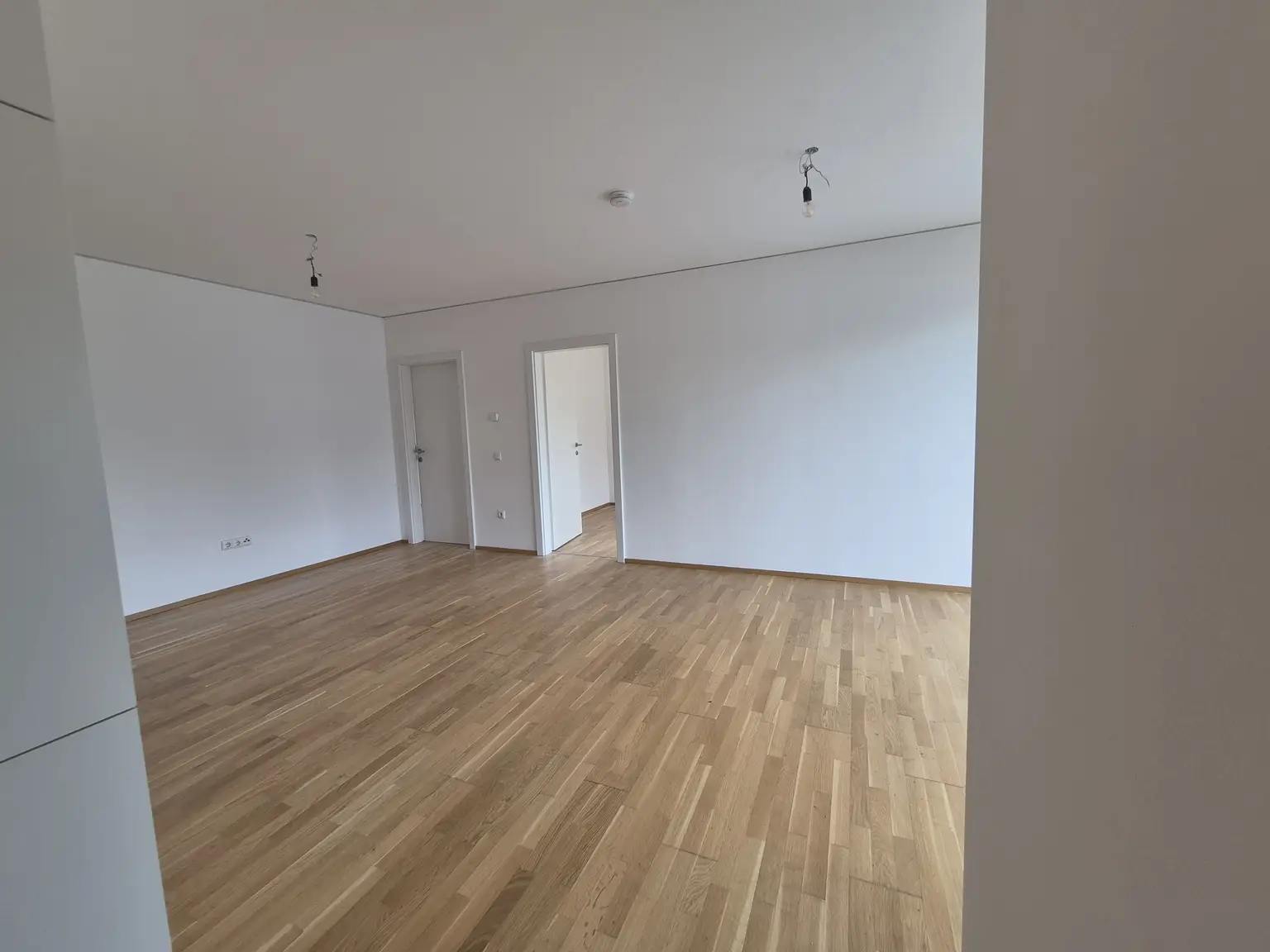 Neubau: Tolle ca. 65 m² Wohnung mit ca. 64 m² Eigengarten und Terrasse