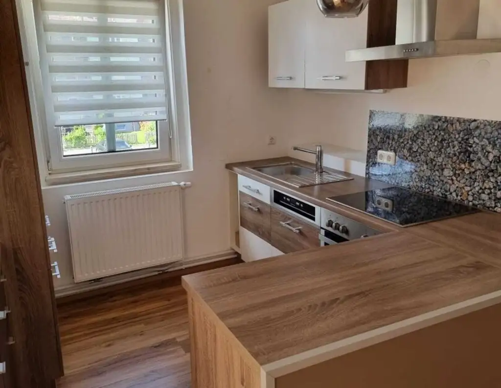 Mehrparteienhaus mit 3 Einheiten, großem Garten und Keller in Villach