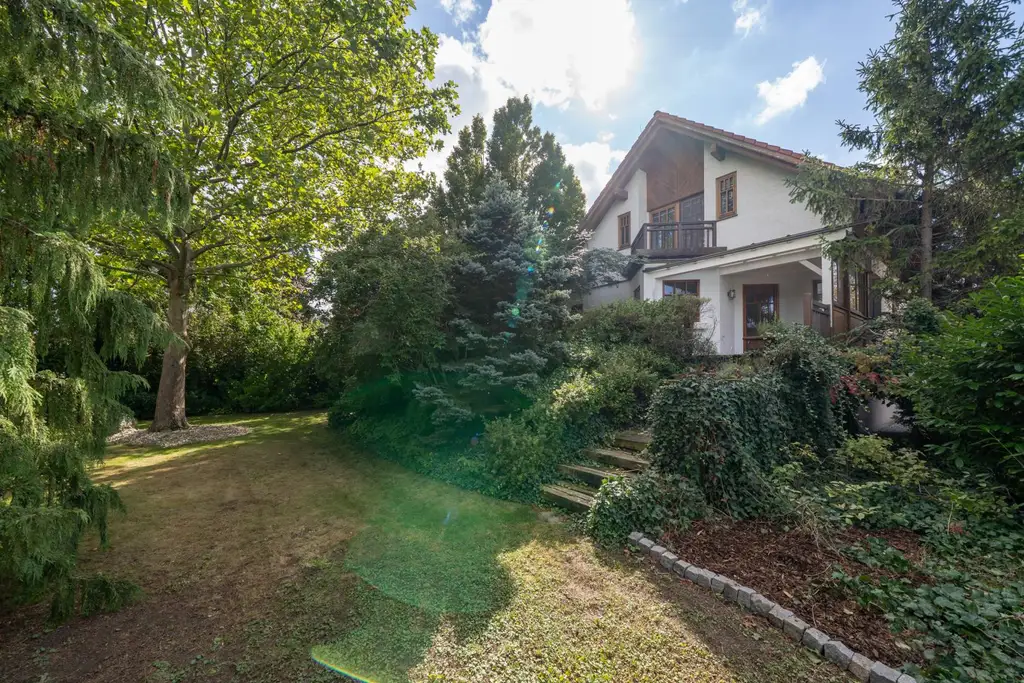 EIN HAUS MIT CHARAKTER! Einzigartiges Einfamilienhaus mit traumhaftem Garten, Garage und mehr!