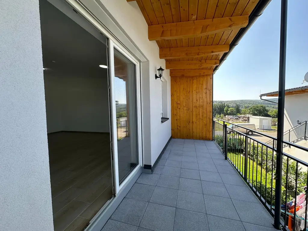 Exklusiv wohnen im Grünen – 4-Zimmer-Neubauwohnung mit Balkon zu kaufen