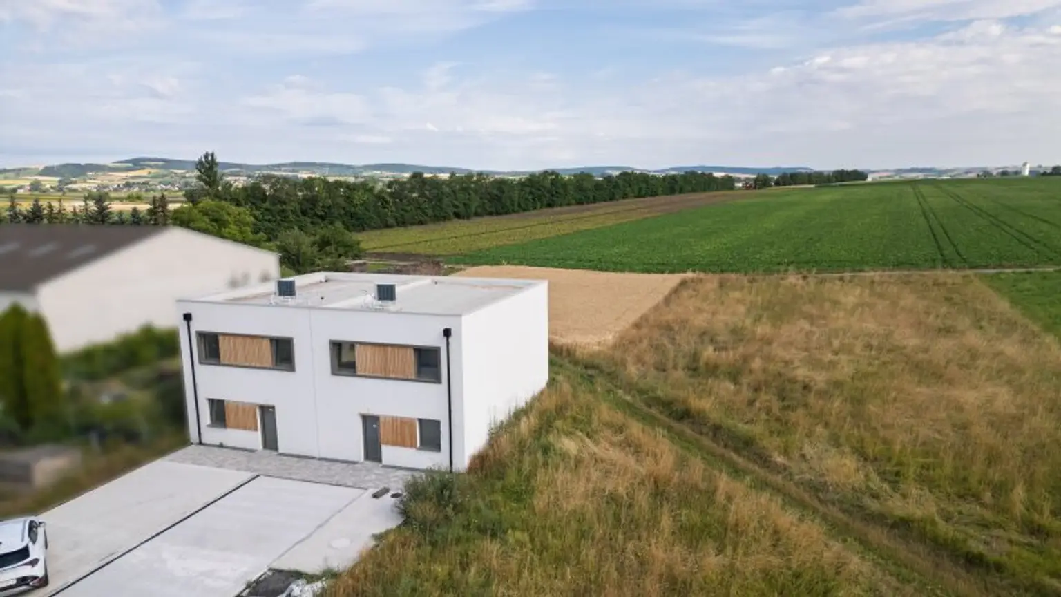 Erstbezug in idyllischer Doppelhaushälfte in Stetten - Wohnkomfort mit Garten und Stellplätzen