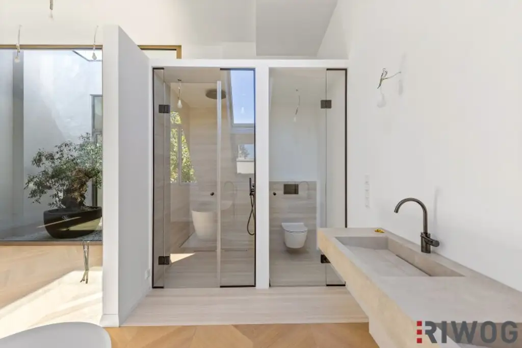3,7m Raumhöhe im DG, Garage mit 2 Stellplätze, Atrium, Aufzug in die Wohnung und 360° Dachterrasse