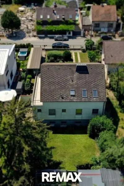 Gepflegtes Mehrfamilienhaus mit zwei separaten Wohneinheiten in absoluter Grünruhelage