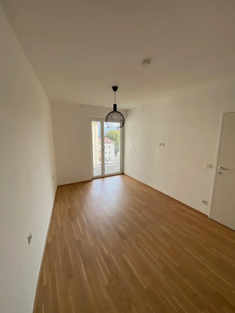 Moderne Neubauwohnung im Zentrum – mit Loggia u. Lift ! TIEFGARAGENPLATZ und KONTROLLIERTE WOHNRAUMBELÜFTUNG