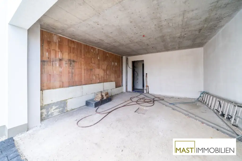 ERSTBEZUG - Modernes Einfamilienhaus mit 148 m² Wohnfläche, Balkon, Terrasse & 2 PKW-Stellplätzen in Strasshof – belagsfertig!