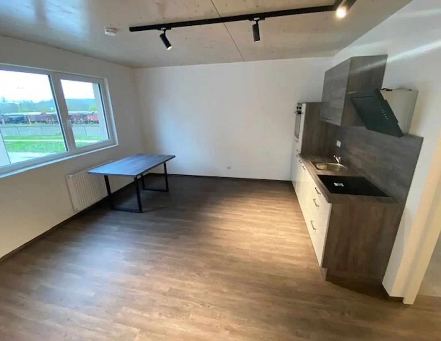 Traumhafte 2-Zimmer-Wohnung in Timelkam: Erstbezug inkl. Allg. Garten und Balkon!