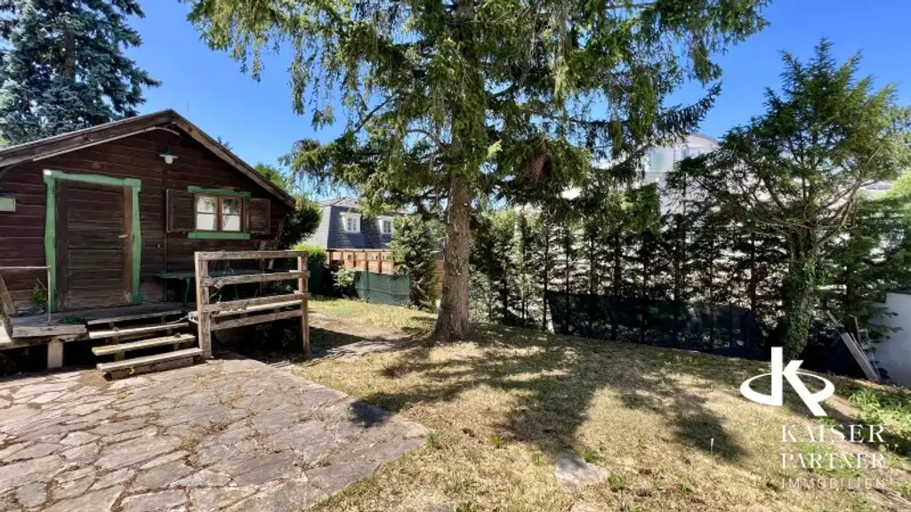 Modernes Wohnen in Wiens grüner Oase - Lichtdurchflutetes Haus mit Topterrasse und Weitblick!