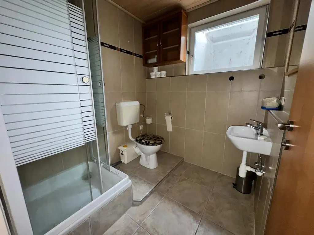 XXL Traum Bungalow mit Kachelofen überdachter Terrasse, Gartenoase, Wohnkeller und Doppelgarage  im Laahfeld /Ansfelden