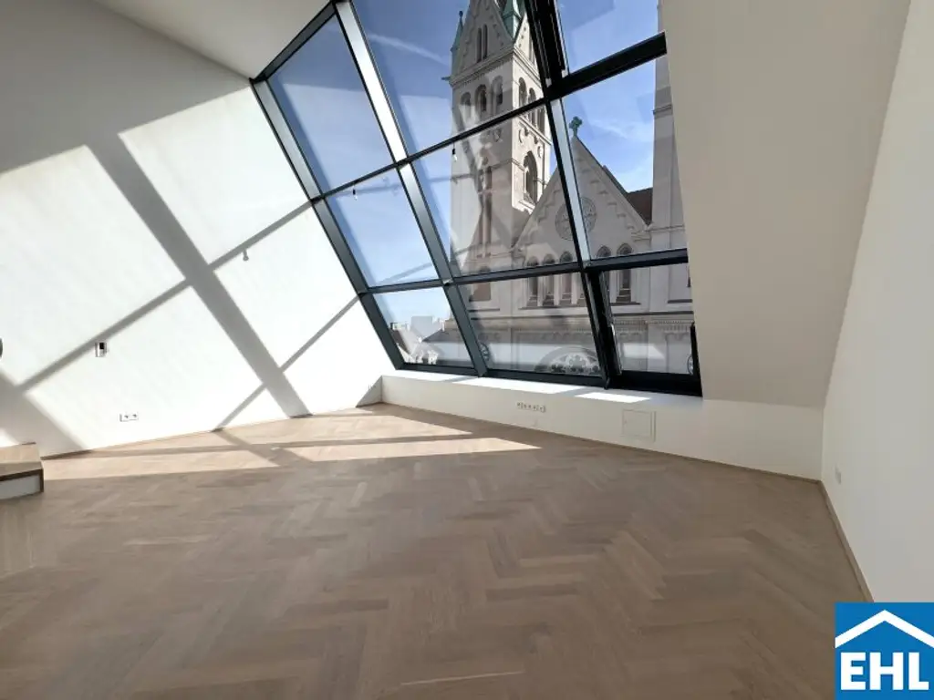 Spektakuläre Dachgeschoßmaisonette mit Terrassentraum und Blick auf die Canisiuskirche