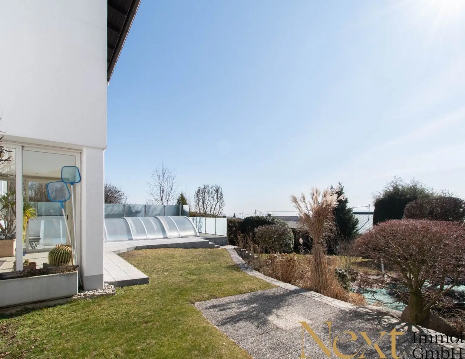 Exklusives Einfamilienhaus in Altenberg (Oberbairing) bei Linz mit Einliegerwohnung, Pool und Wintergarten!