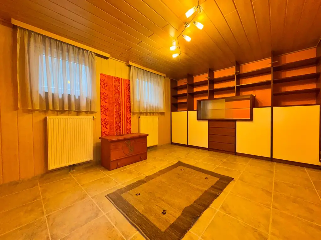 XXL Traum Bungalow mit Kachelofen überdachter Terrasse, Gartenoase, Wohnkeller und Doppelgarage  im Laahfeld /Ansfelden