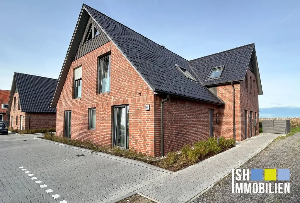 Jung wohnen im Alten Land! Moderne 4-Zi-EG-Wohnung mit Blick ins Grüne