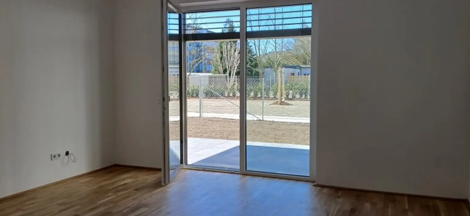 NEUBAU - ERSTBEZUG - Top 5 - Wunderschöne 2 Zimmerwohnung mit Terrasse, kleinem Garten und eigenem Tiefgaragenplatz