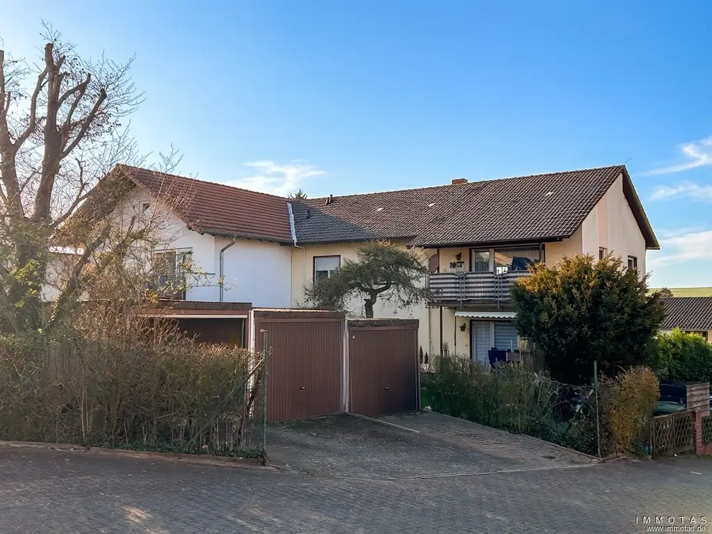 Gepflegtes Mehrfamilienhaus mit 4 Einheiten, voll vermietet, großes Grundstück in ruhiger Lage