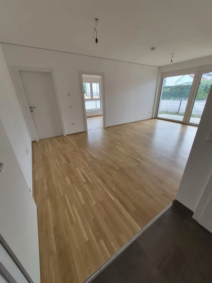 Neubau: Tolle ca. 65 m² Wohnung mit ca. 64 m² Eigengarten und Terrasse